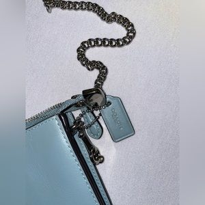 Little blue Coach clutch.